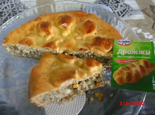 Фото рецепта Рыбный пирог с рисом и яйцами