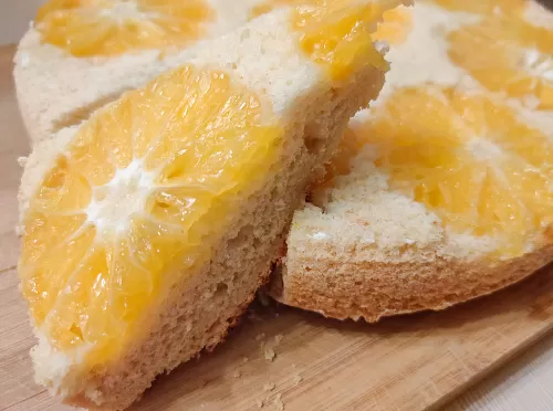 Фото рецепта Бисквитный пирог с мандаринами