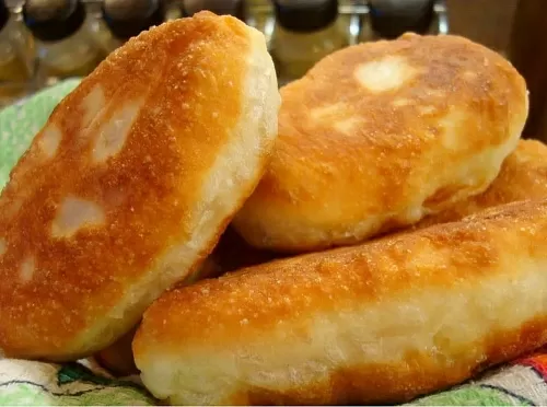 Фото рецепта Пирожки с грибами и квашеной капустой