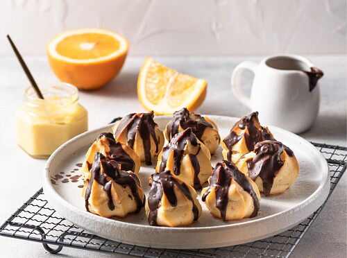 Фото рецепта Профитроли с апельсиновым кремом